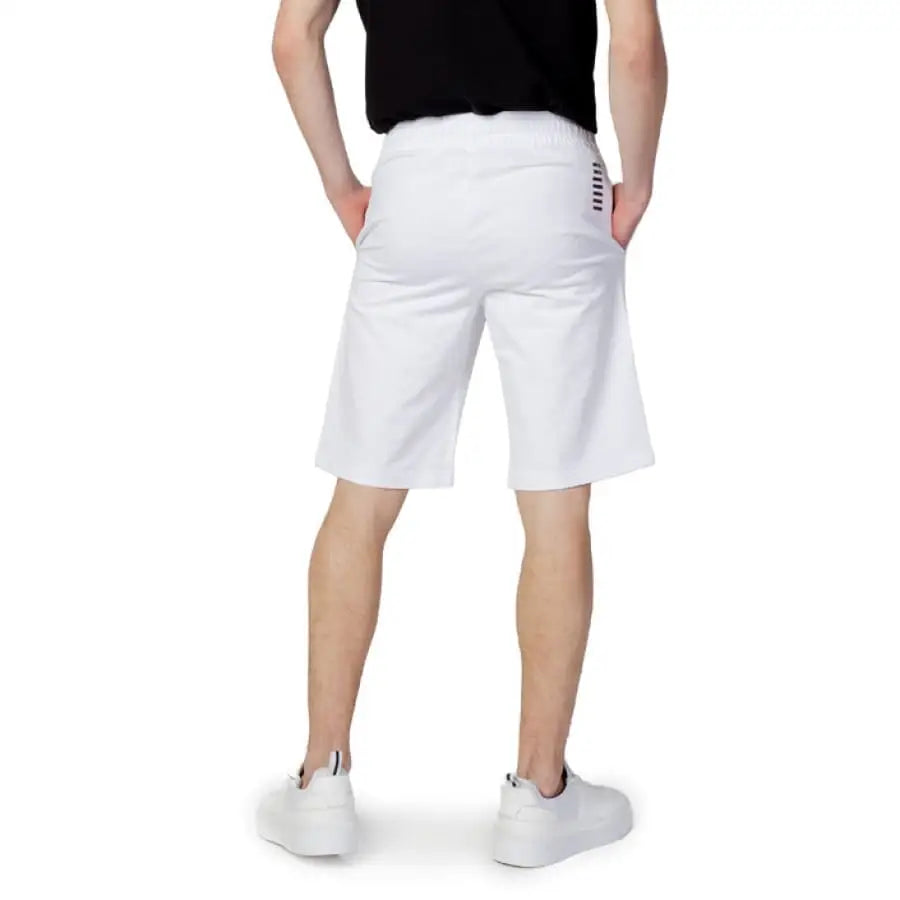 Ea7 men shorts for spring summer - man in white shorts and black t-shirt