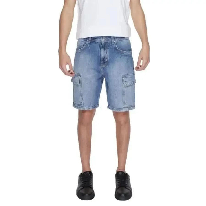 Man in white T-shirt and blue denim shorts from Antony Morato Men Shorts collection