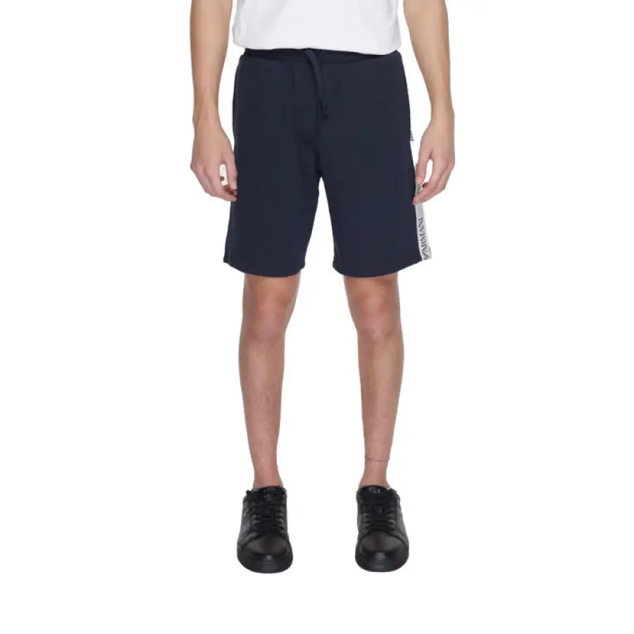 
                      
                        Man modeling Emporio Armani underwear shorts in white T-shirt
                      
                    