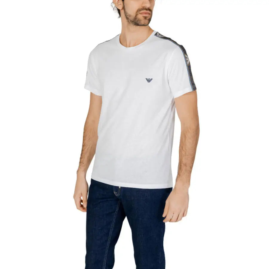 
                      
                        Emporio Armani underwear model in white t-shirt and jeans showcasing men’s fashion
                      
                    