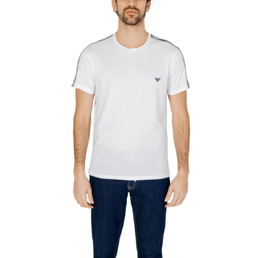 Emporio Armani underwear model in white T-shirt and jeans