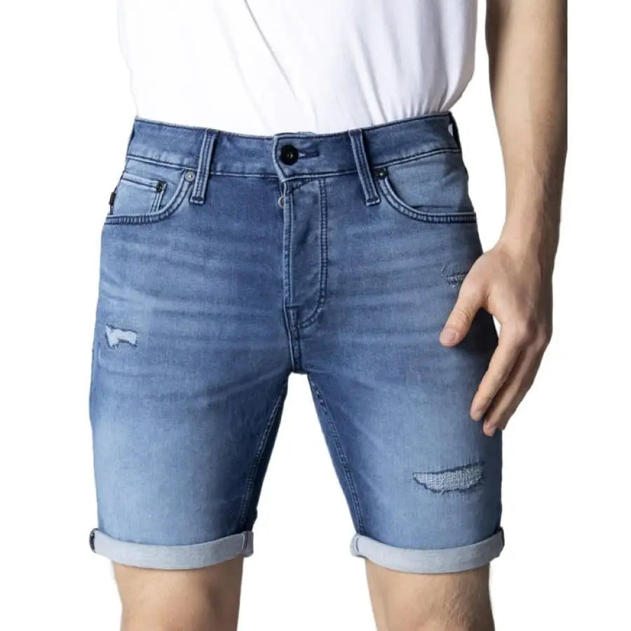 Jack & Jones men in white t-shirt and spring summer blue denim shorts