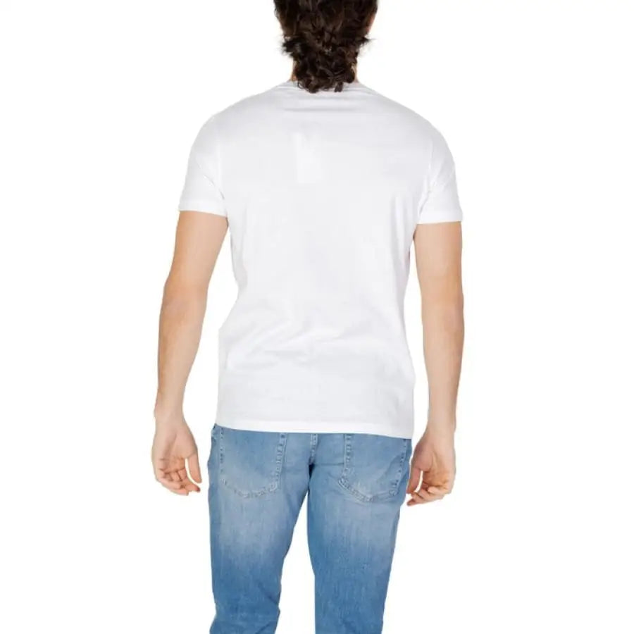 
                      
                        Man wearing U.S. Polo Assn. men t-shirt and jeans, showcasing apparel accessories
                      
                    