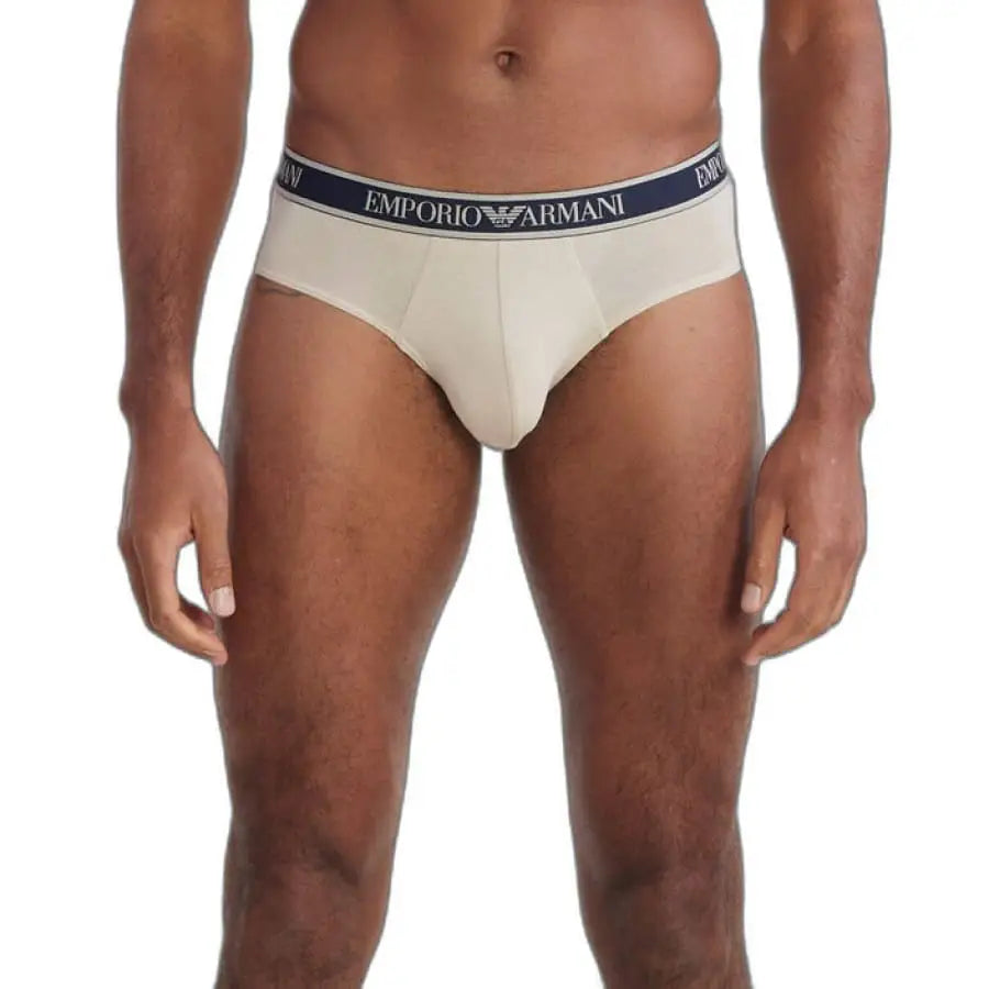 
                      
                        Man modeling Emporio Armani men underwear in white
                      
                    