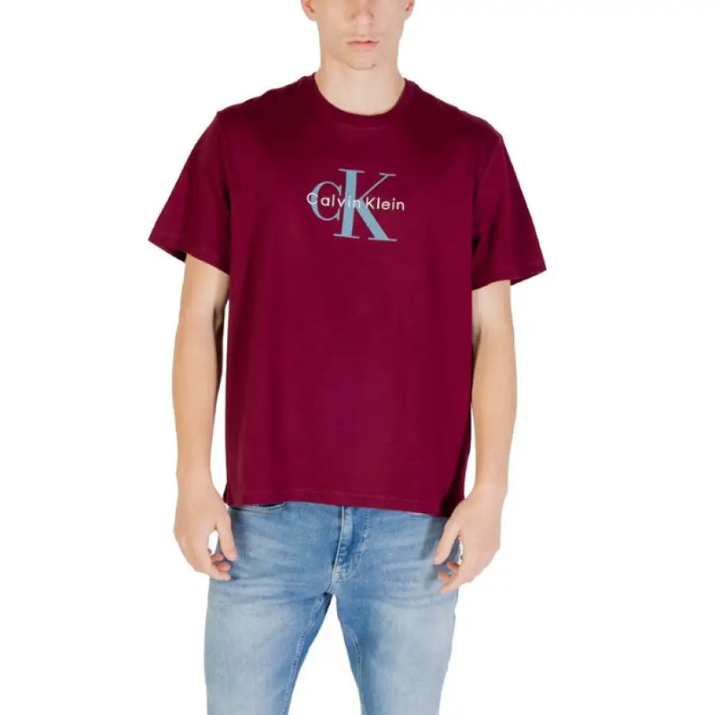 Maroon Calvin Klein T shirt styled with blue jeans for a casual look