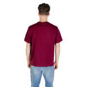 Maroon Calvin Klein T-shirt paired with classic blue jeans for a stylish look