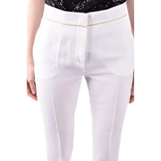MaxMara white women’s high-waisted trousers with gold-trimmed waistband and sleek tailored fit for spring summer