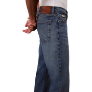 Men’s blue jeans showing the back side with dark blue denim and a brown leather brand patch on the waistband