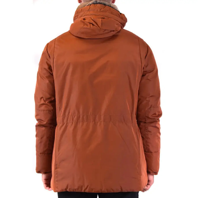 Mens brown fur trimmed hooded parka in warm rust color with quilted design and light brown faux fur lined hood