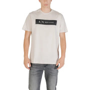 Mens cream-colored Armani Exchange t-shirt with a black rectangular logo featuring white lettering across the chest