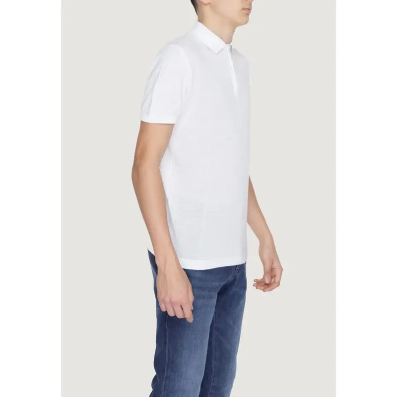 Men’s white polo shirt with short sleeves, classic collar, and neat stitching in breathable cotton material