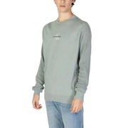 Mint green Calvin Klein Jeans crewneck sweatshirt featuring minimal branding for men