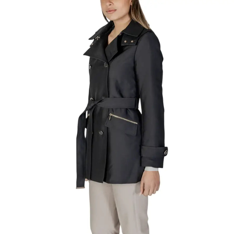 Woman wearing Morgan De Toi black cotton blend long blazer with belted waist and zip pockets
