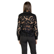 Morgan De Toi black lace long sleeve round neck blouse featuring intricate floral patterns and sheer fabric