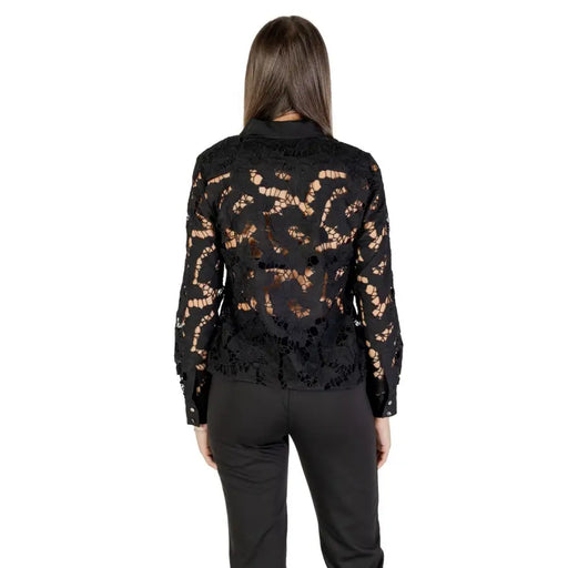 Women’s black long-sleeved sheer lace blouse and black trousers from Morgan De Toi