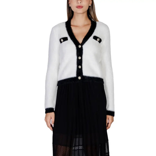 White and black fuzzy knit cardigan with pearl buttons from Morgan De Toi for fall winter fashion