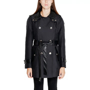 Woman wearing Morgan De Toi black double-breasted trench coat with belted waist