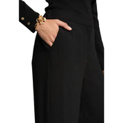 Goldenes florales Armband mit aufwendigen Details, getragen mit morgan de toi Schwarze Damen-Polyesterhose mit Taschen