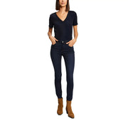 A pair of dark navy high-waisted skinny jeans with classic five-pocket design paired with morgan de toi blue v neck polyester t shirt plain short
