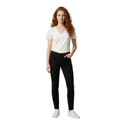 Black skinny jeans with sleek form-fitting design and classic five-pocket styling paired with morgan de toi women white v neck cotton t shirt short sleeve