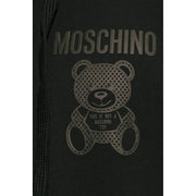Black cotton Moschino men sweatshirt hoodie featuring perforated teddy bear graphic with brand slogan on front