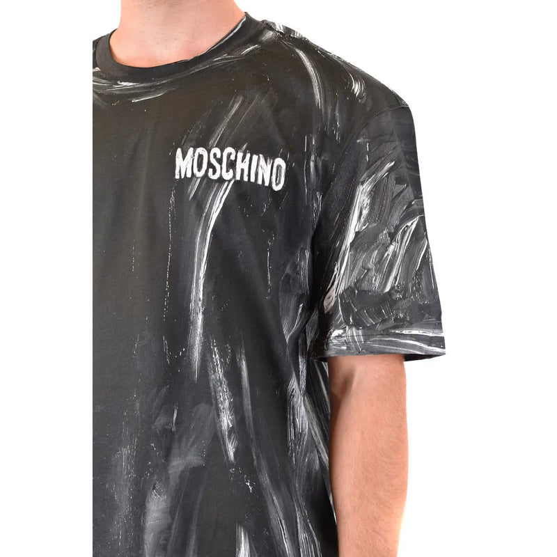 Schwarz Moschino Männer t-shirt mit weißem Pinselstrichmuster und Markennamen auf der Brust
