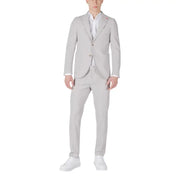 Men’s light grey two-piece suit with white shirt and sneakers from Mulish Grey collection