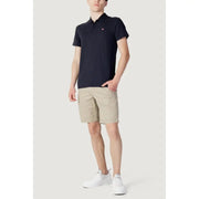 Navy blue short-sleeved cotton polo shirt for men by Napapijri with a small red logo on the left chest for spring summer