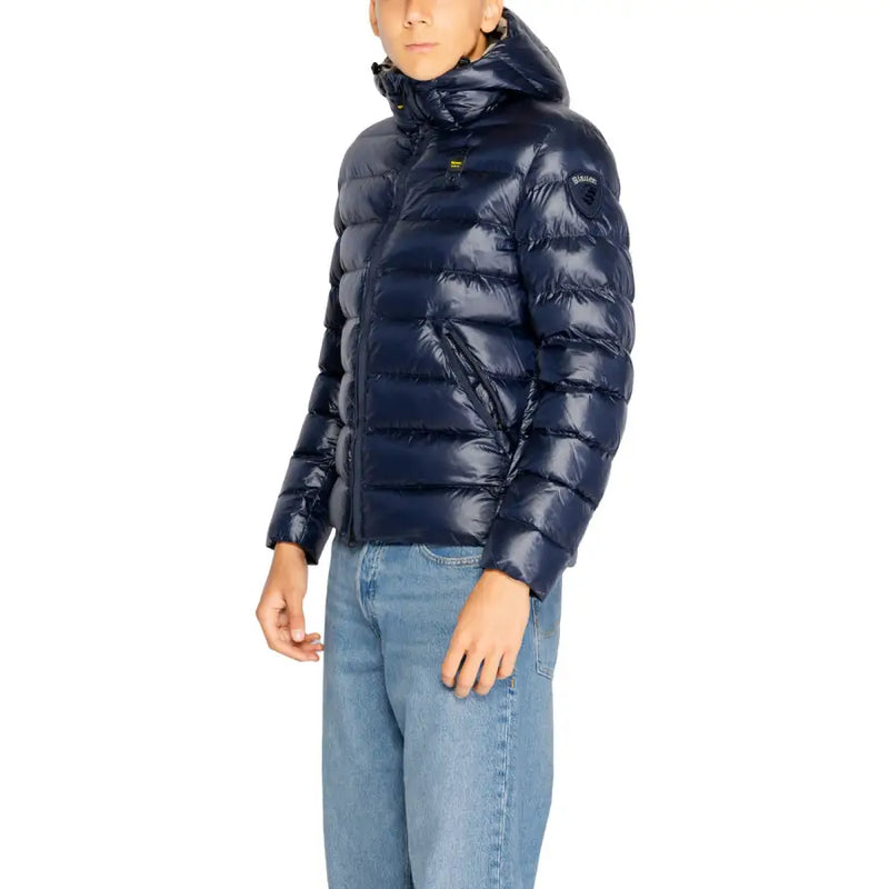 Navy blue hooded quilted puffer jacket with subtle brand logo on the chest for cold weather wear