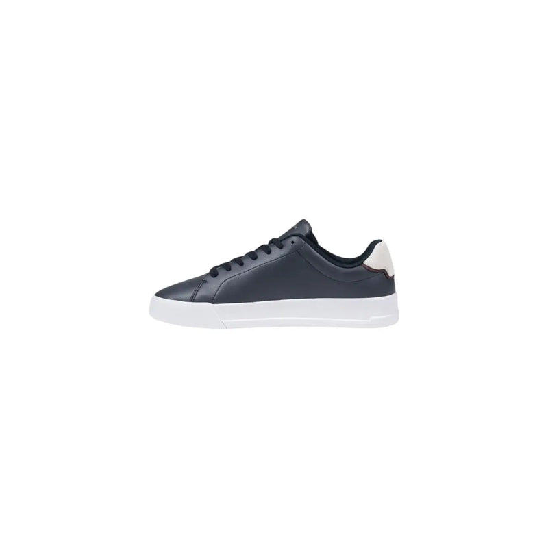 Dark navy leather low-top sneaker with white rubber sole and cream-colored heel tab by Tommy Hilfiger