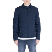 Navy blue quilted puffer jacket displayed in a product listing