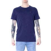 Navy blue Tommy Hilfiger T-shirt on tattooed model from Tommy Hilfiger Men’s Collection