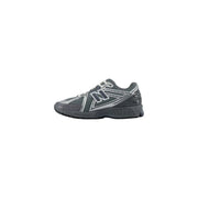New balance Graue Herren-Sneaker aus Synthetik mit geometrischem Muster, grau-silbernem Mesh-Obermaterial und profilierter Gummisohle.