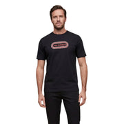 New Balance men t-shirt in black featuring a pink and white oval logo with the brand name centered on the chest