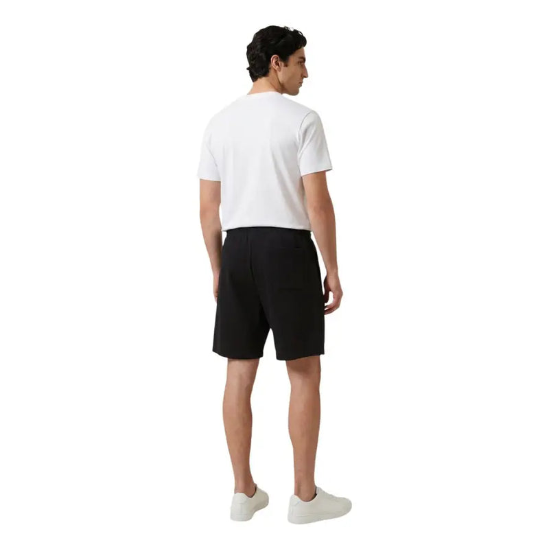 Schwarze, maßgeschneiderte Shorts mit klarem, minimalistischem Design new balance Männer t-shirt Produktkollektion