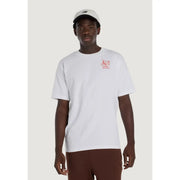 New Balance men t-shirt in white cotton with a red embroidered logo on the left chest for casual wear