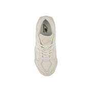 Cream-colored New Balance 1906r sneaker with mesh and suede upper for women in beige suede sneakers collection