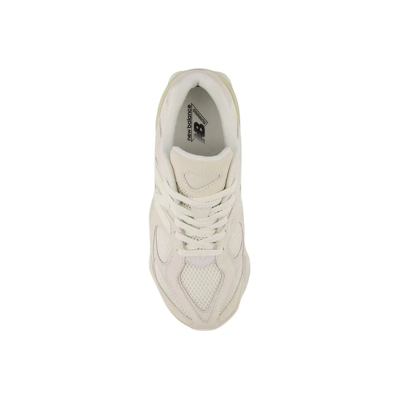 Cream-colored New Balance 1906r sneaker with mesh and suede upper for women in beige suede sneakers collection