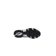 White and black New Balance women beige synthetic slip sneakers with textured rubber sole and blue heel accents viewed from back