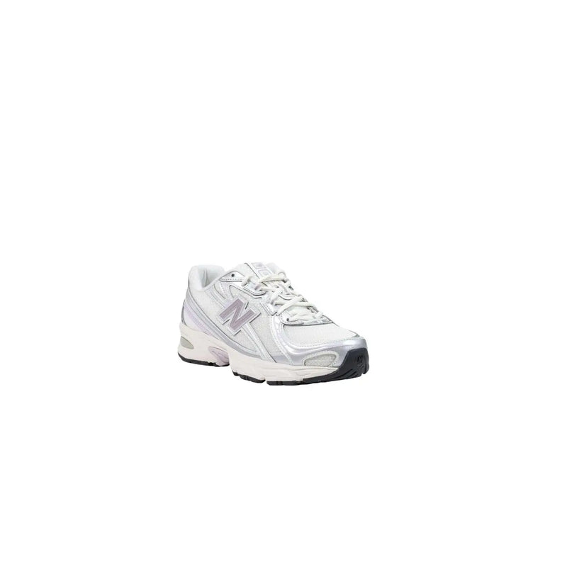New balance women beige synthetic slip-on sneakers with white and silver sleek modern athletic design