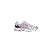 New Balance women grey slip on textile skate sneakers with white and pink running shoe design and gray accents