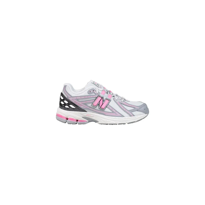 New Balance women grey slip on textile skate sneakers with white and pink running shoe design and gray accents