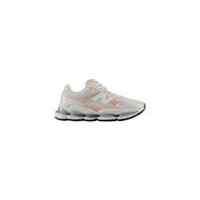 New Balance women grey sneakers with pastel pink mesh upper and layered cushioning in textile synthetic material