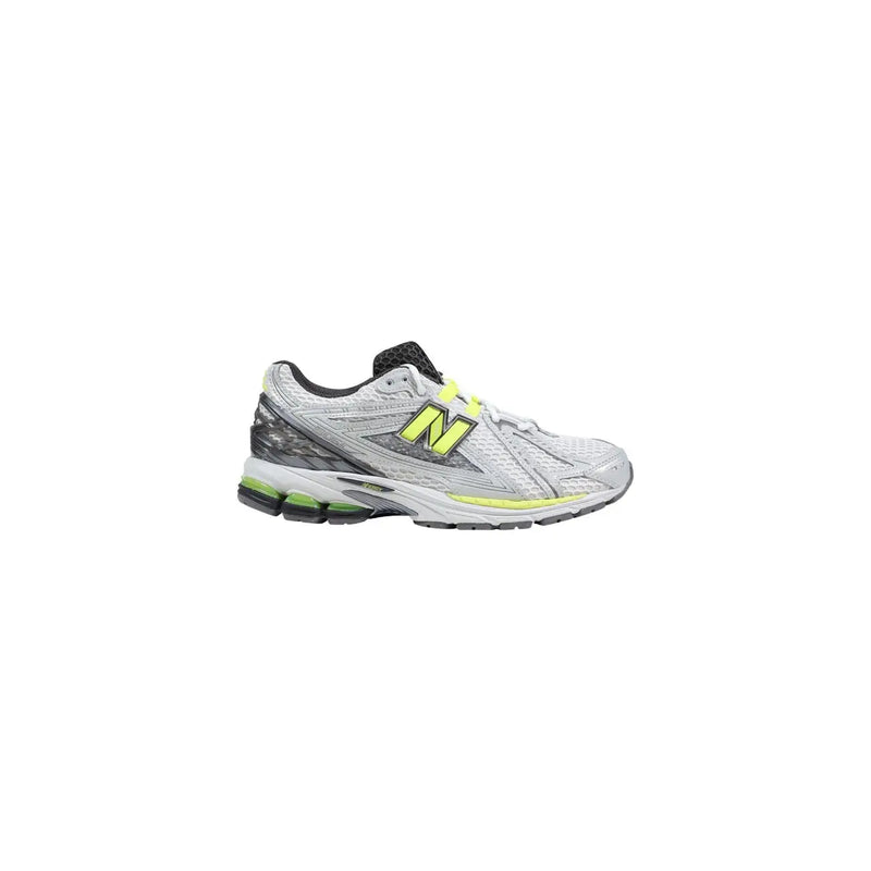 New balance women grey synthetic sneakers featuring silver and neon yellow mesh upper with black accents