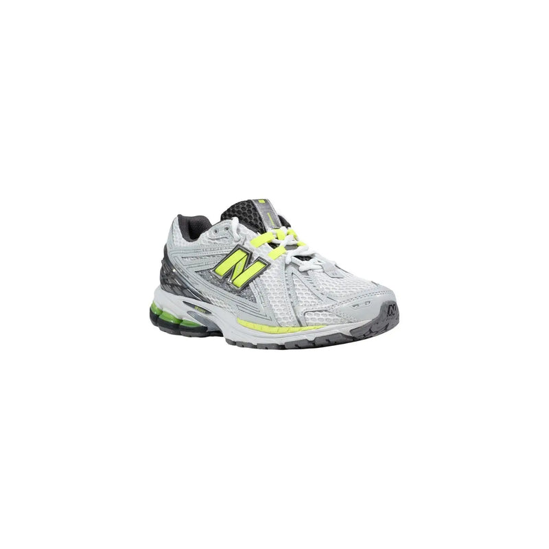 New Balance women grey synthetic sneakers with white and neon green mesh upper and black accents running shoe