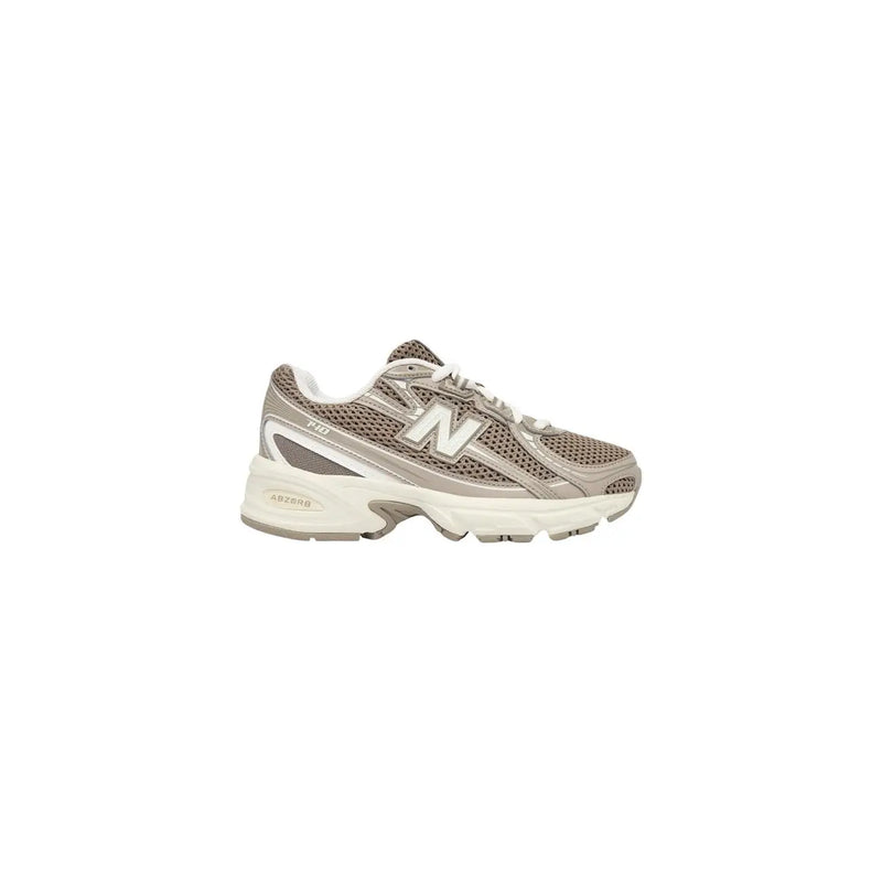 New Balance women grey textile sneakers featuring gray mesh with white accents and a chunky sole