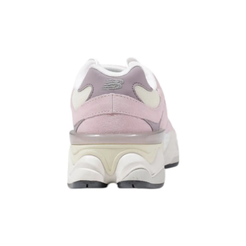 New balance women leather sneakers pink featuring a chunky layered sole in pink and white colorway