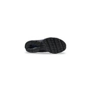 Backside view of new balance women lilac synthetic sneakers featuring black rubber sole with textured tread and blue accent