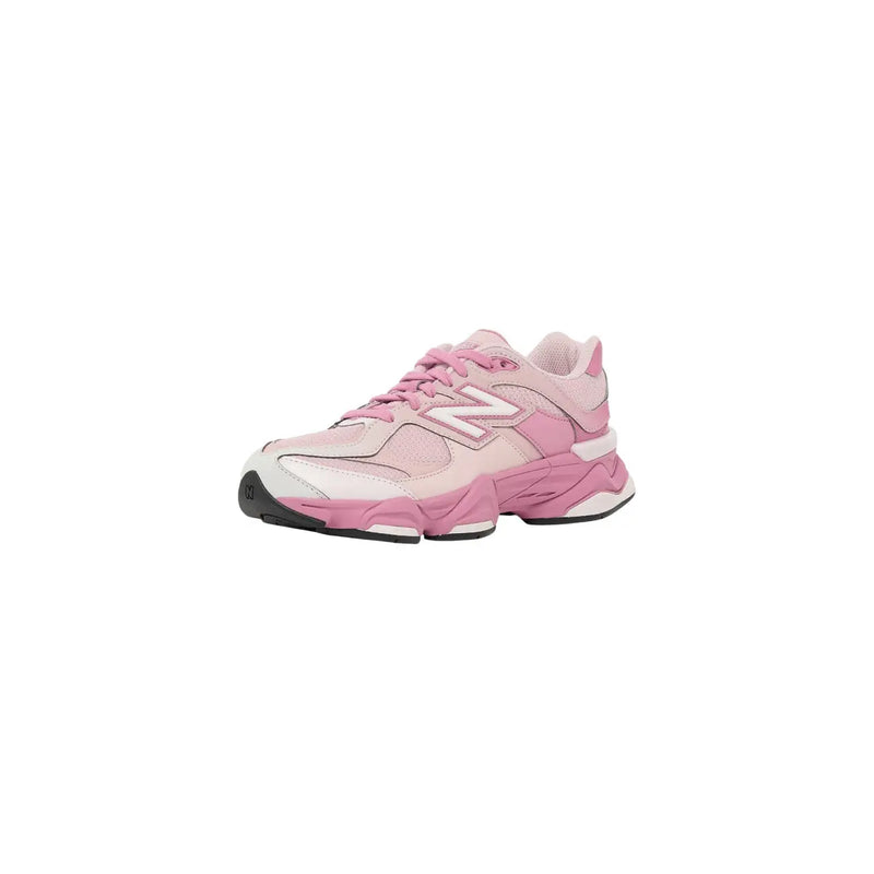 New balance women pink suede sneakers with white accents and chunky sole for stylish casual wear