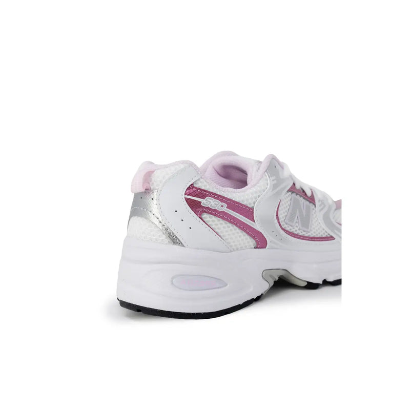 New Balance women pink synthetic sneakers featuring white and pink mesh upper with silver accents and chunky white midsole